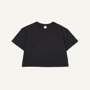 An organic cotton boxy tee in graphite gray color on a plain background.