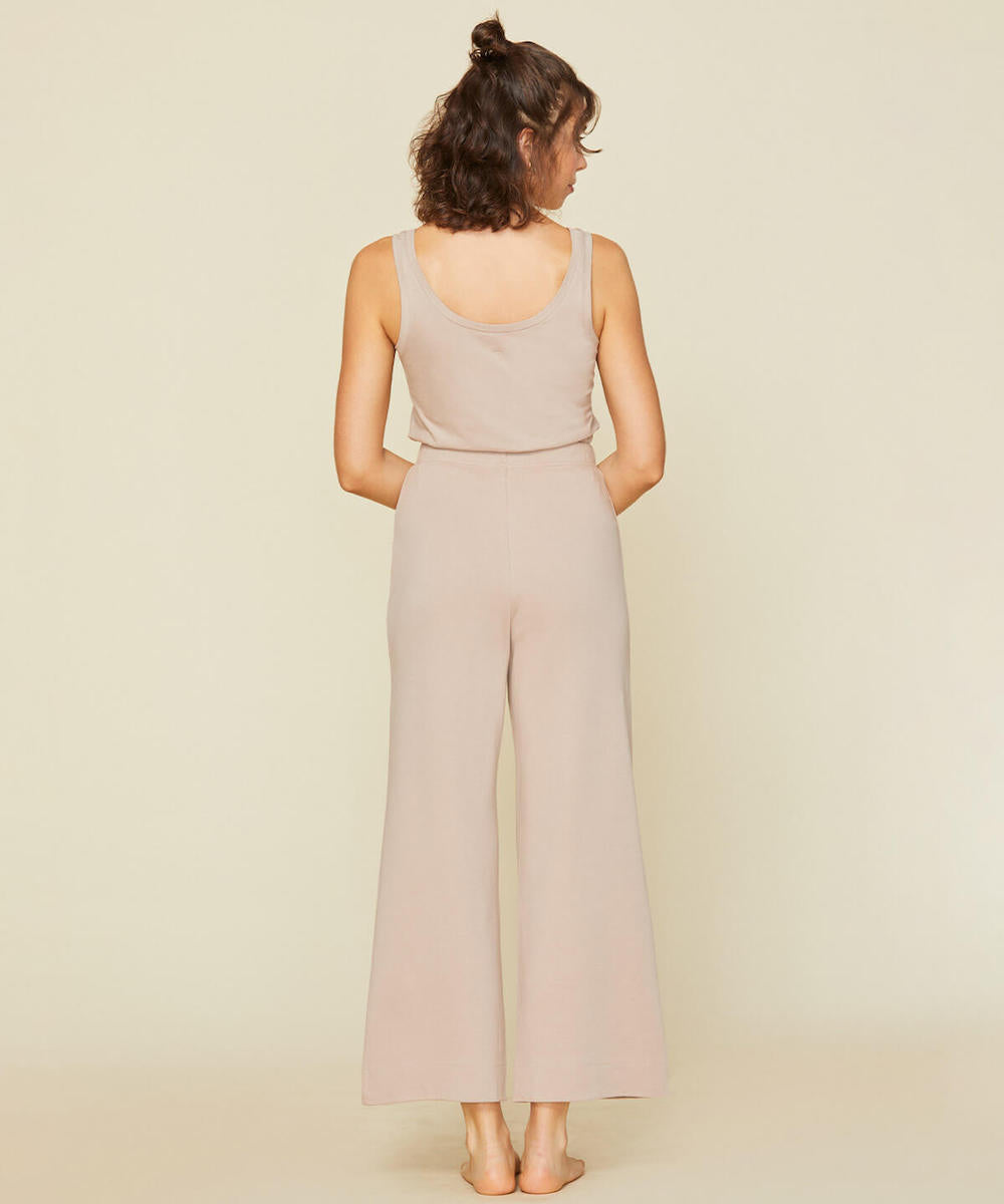 Woman wearing the easy tank in stone beige color