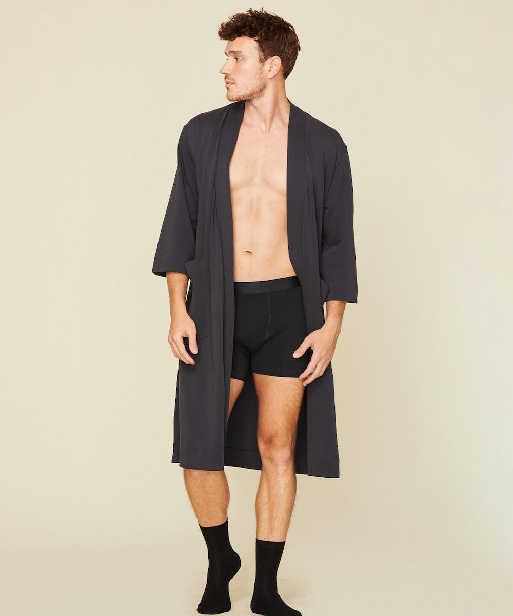 Man wearing the essential robe in graphite gray color