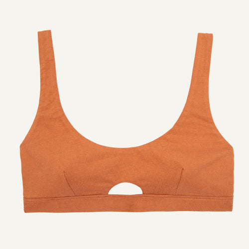 An organic cotton keyhole soft bra in spice orange color