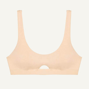 A wheat beige organic cotton keyhole soft bra without underwires.