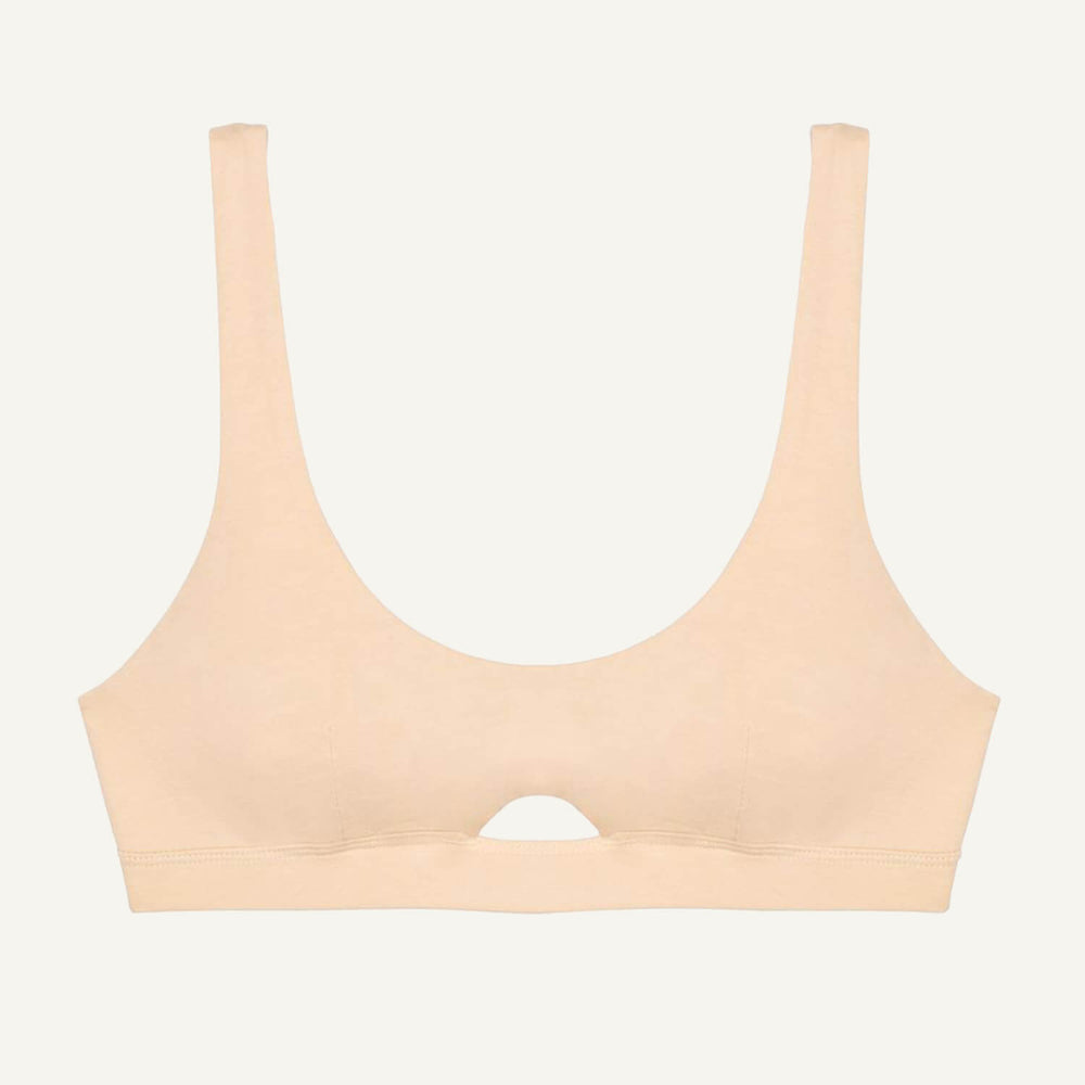 A wheat beige organic cotton keyhole soft bra without underwires.