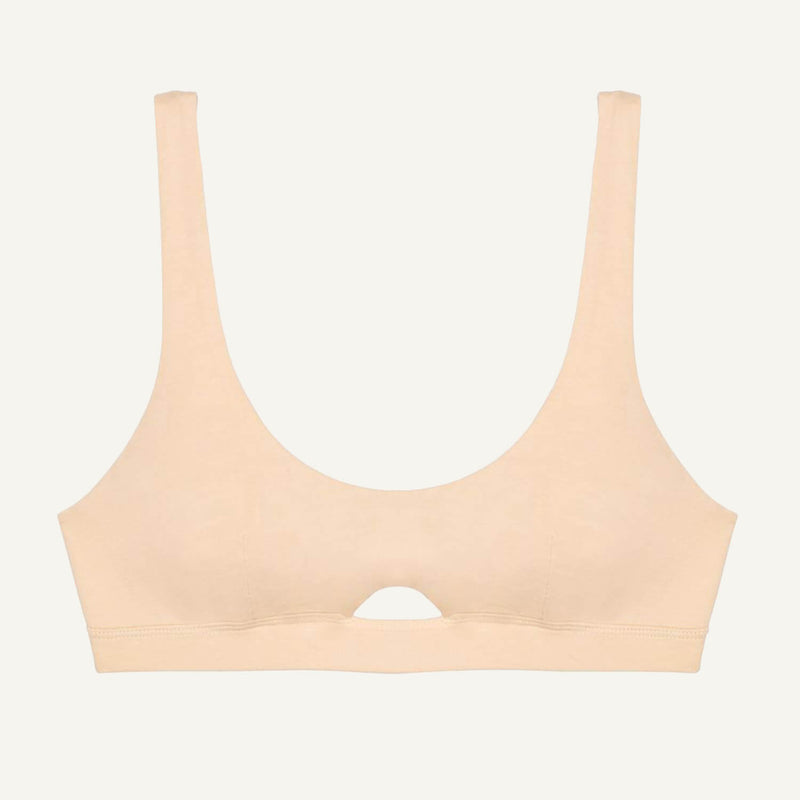 A wheat beige organic cotton keyhole soft bra without underwires.
