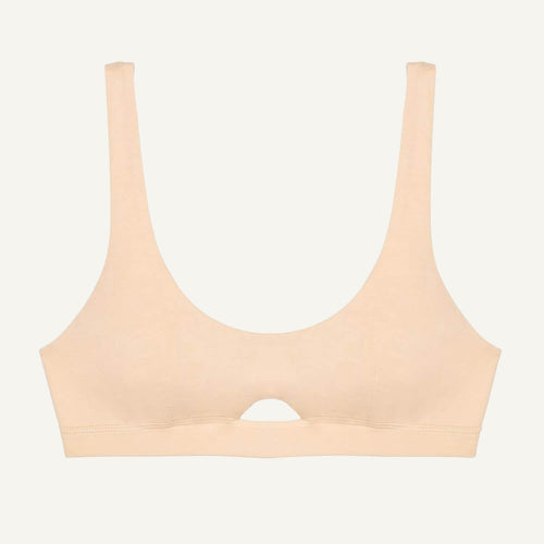 A wheat beige organic cotton keyhole soft bra without underwires.