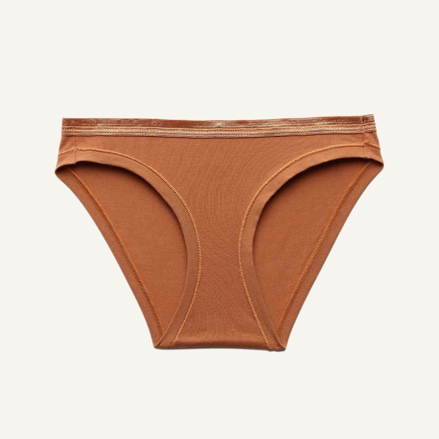 A low rise bikini in spice brown color. 
