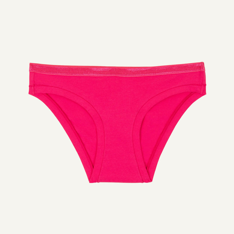 A low rise bikini in aurora pink color.