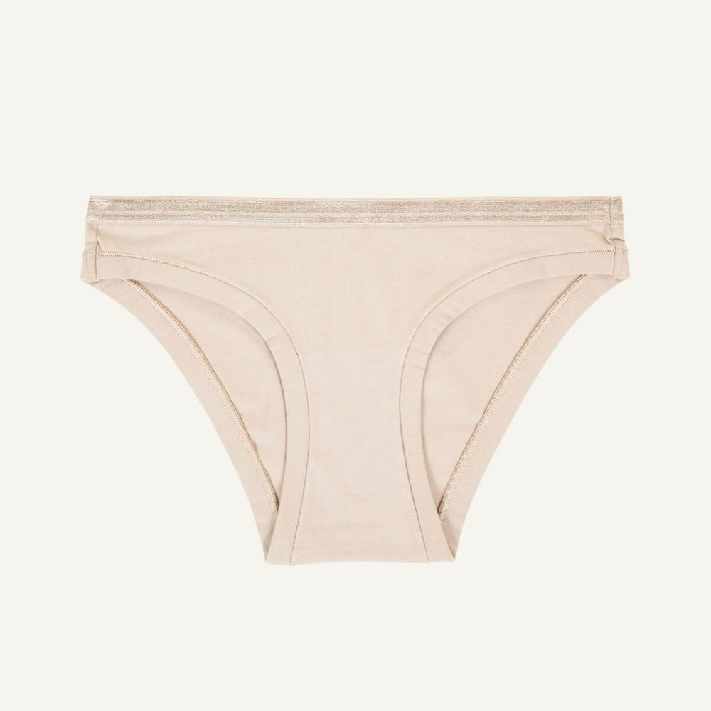 A low rise bikini in stone beige color.