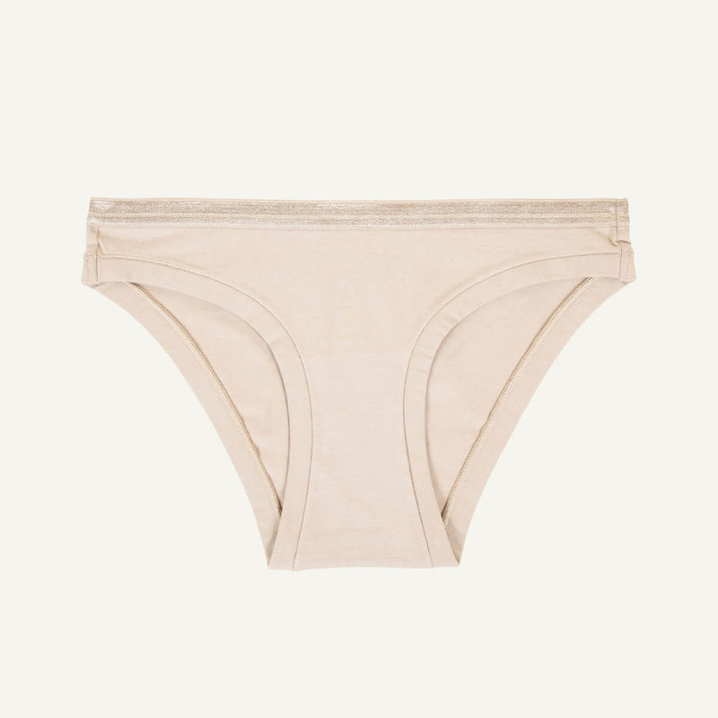 A low rise bikini in stone beige color.
