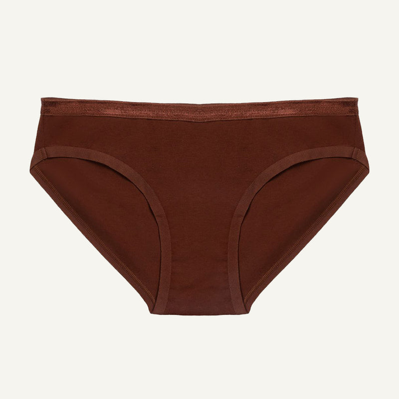 A low-rise organic cotton brief in cacao brown color, with a snug fit and minimal waistband.