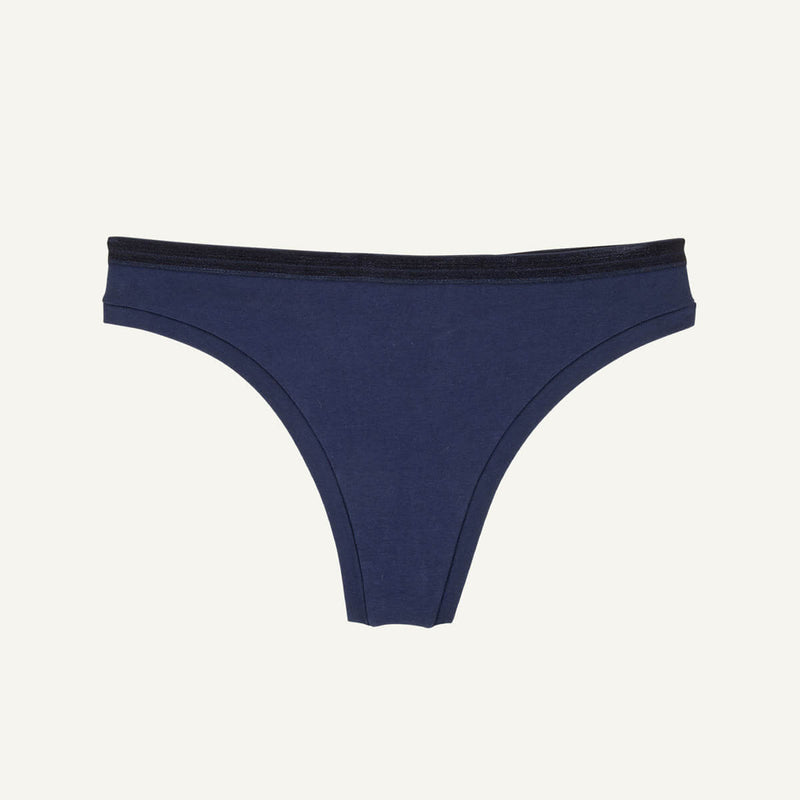 A low rise thong in marine blue color.