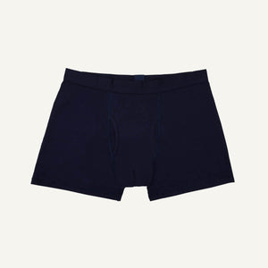 A pair of men's boxer briefs in marine blue color.
