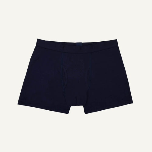A pair of men's boxer briefs in marine blue color.