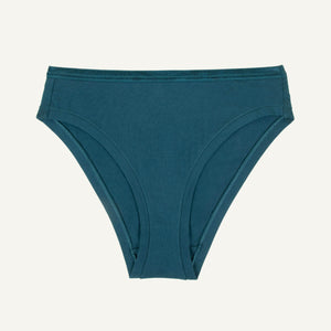 A mid-rise bikini in a meridian teal color.