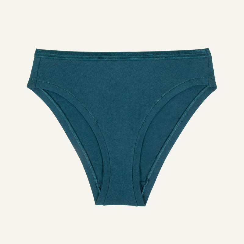 A mid-rise bikini in a meridian teal color.