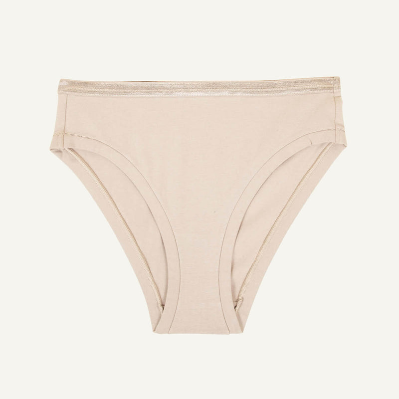 A mid-rise bikini in stone beige color.