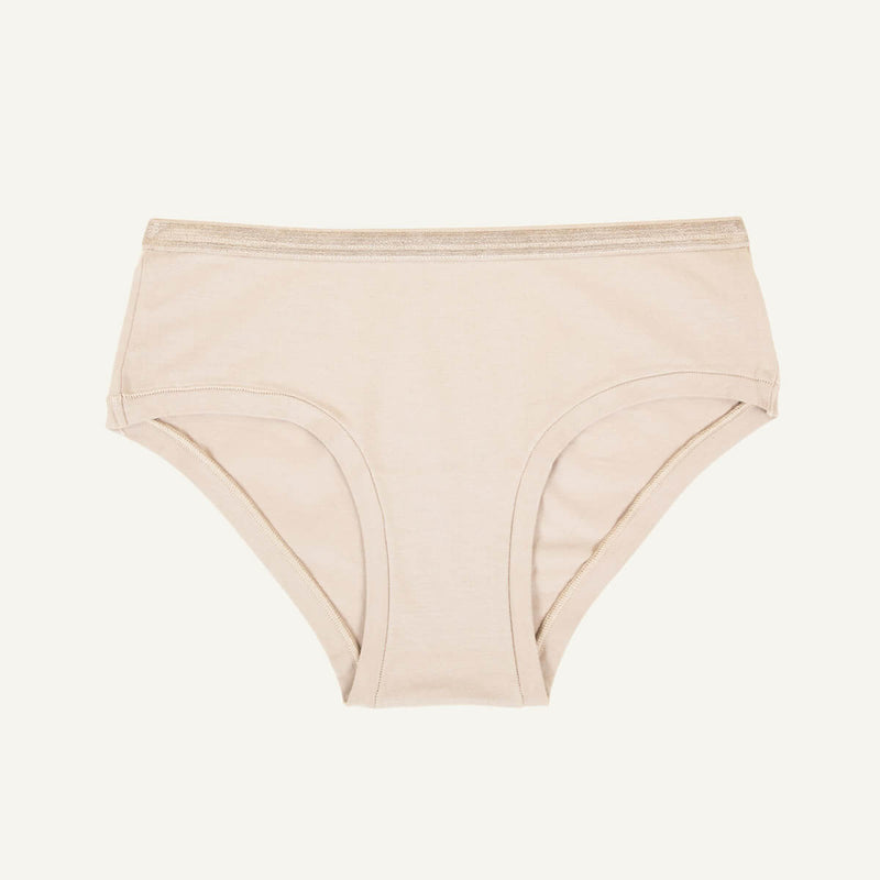 A pair of mid-rise retro hipster underwear in stone beige color.