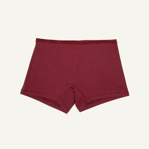 A pair of mid-rise shorties in garnet red color.