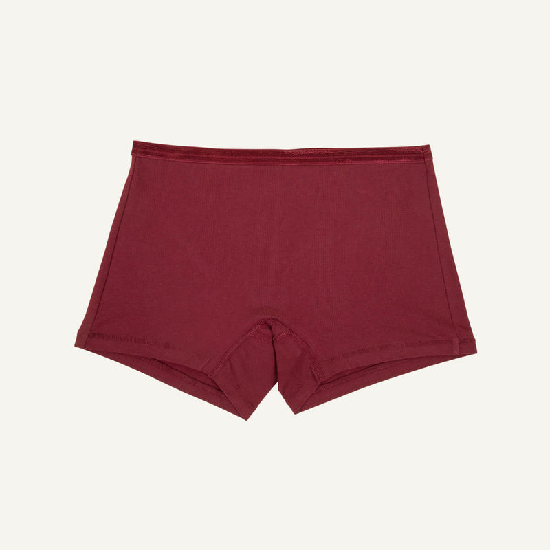 A pair of mid-rise shorties in garnet red color.