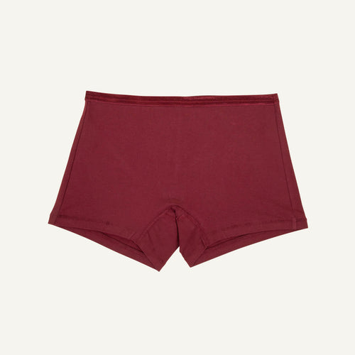 A pair of mid-rise shorties in garnet red color.
