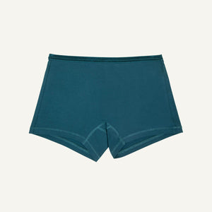 A pair of mid-rise shorties in meridian teal color.