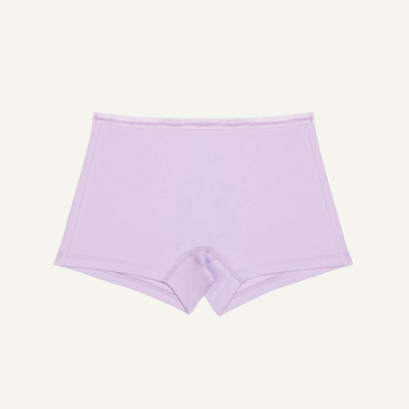 A pair of petal light purple mid-rise organic cotton shorties.
