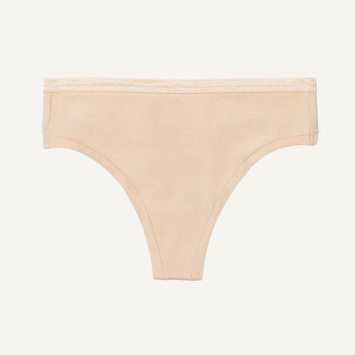 A wheat beige mid-rise thong underwear on a white background.
