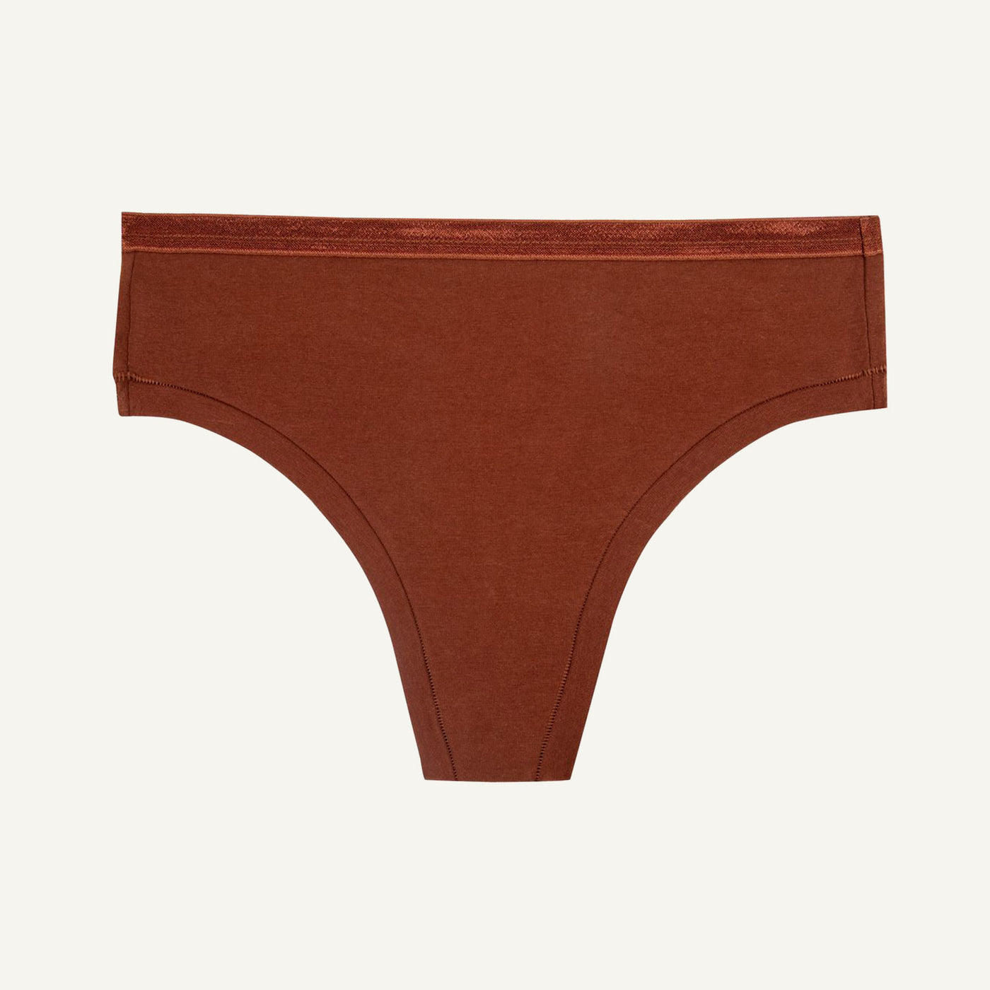 A mid-rise cacao brown thong underwear against a solid background.