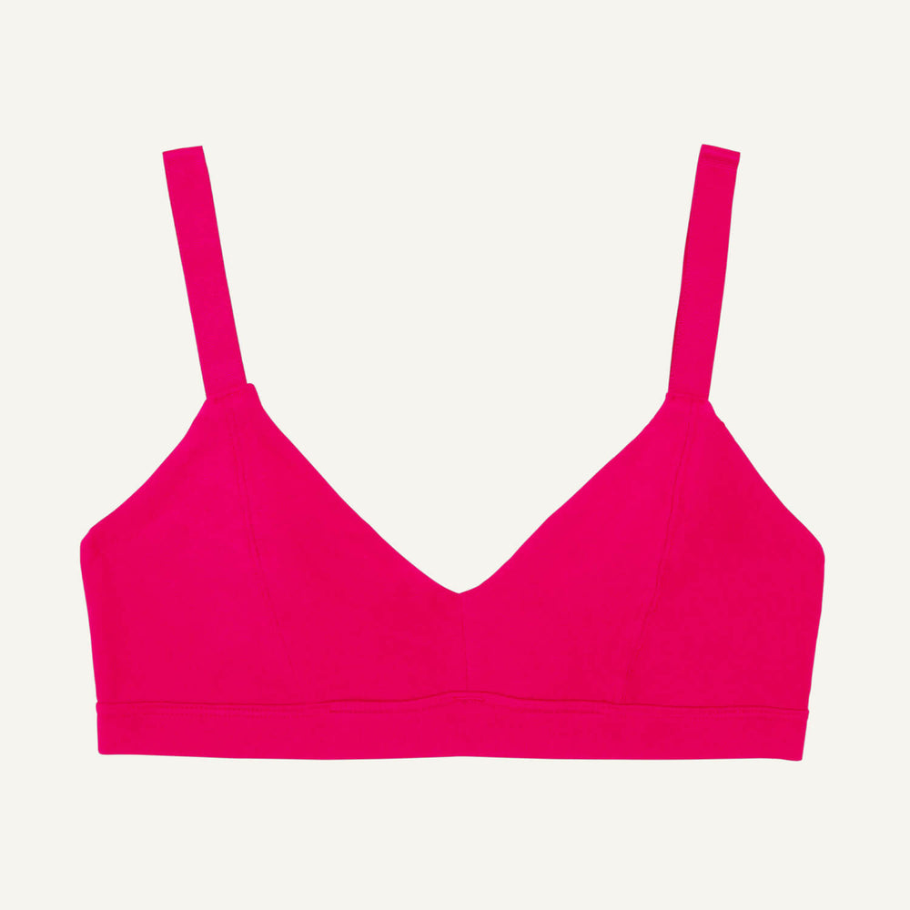 An organic cotton triangle soft bra with adjustable straps in aurora pink color.