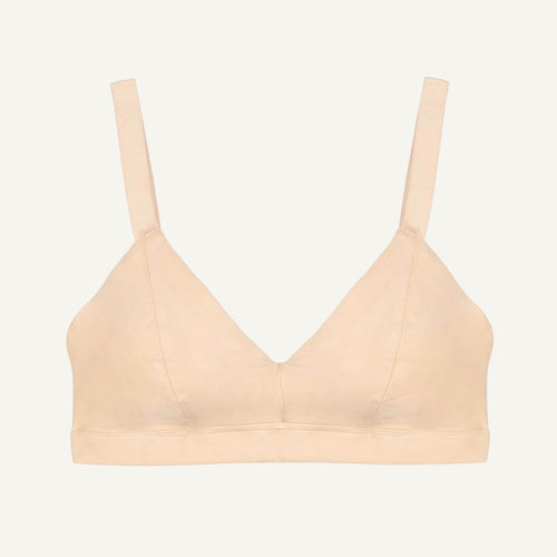 A wheat beige organic cotton triangle soft bra with adjustable straps