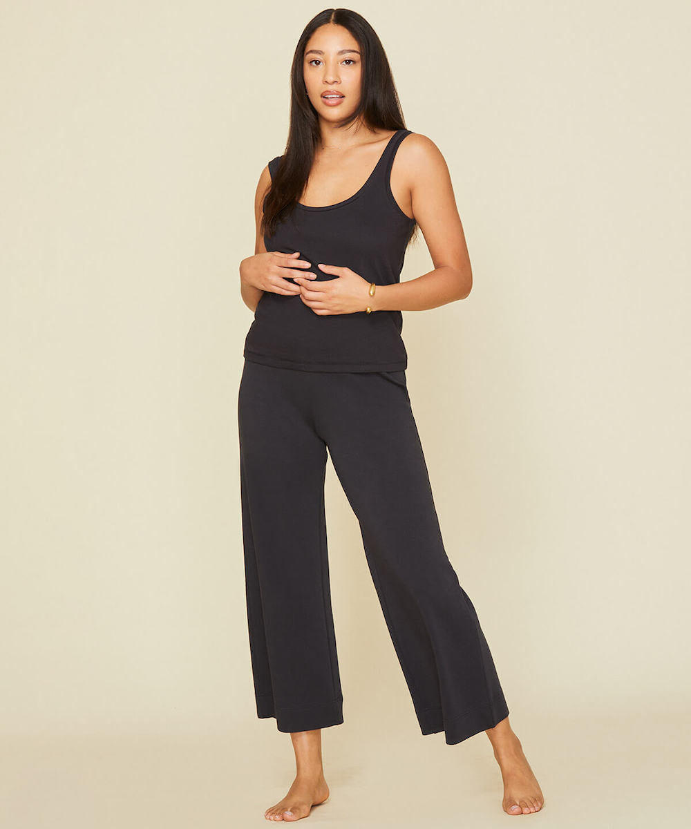 Woman wearing the wide leg pants in graphite gray color