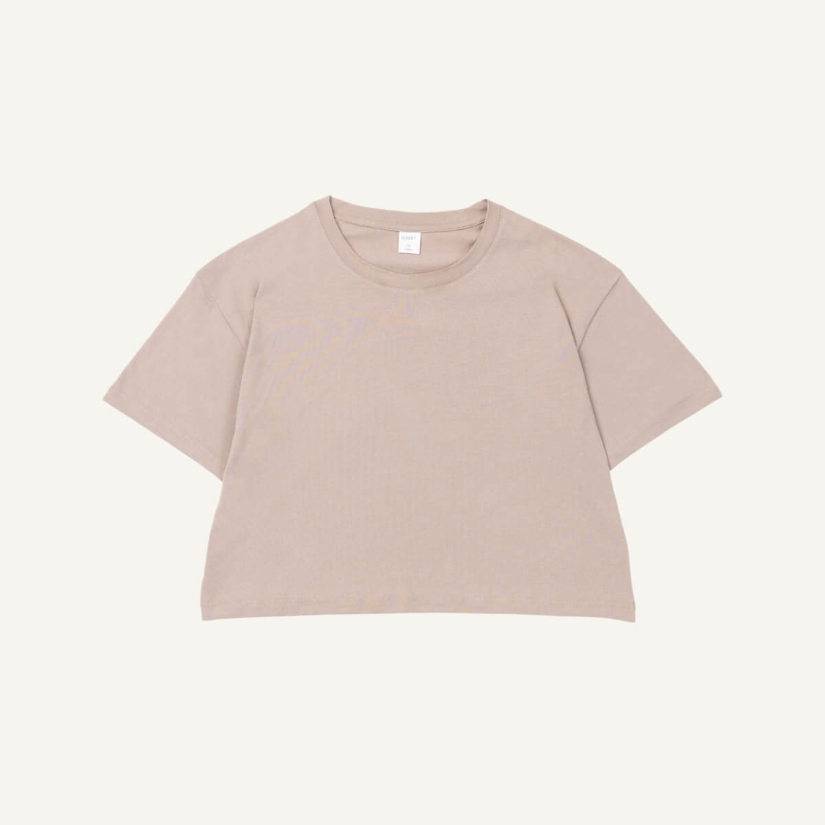 A stone beige organic cotton Boxy Tee.