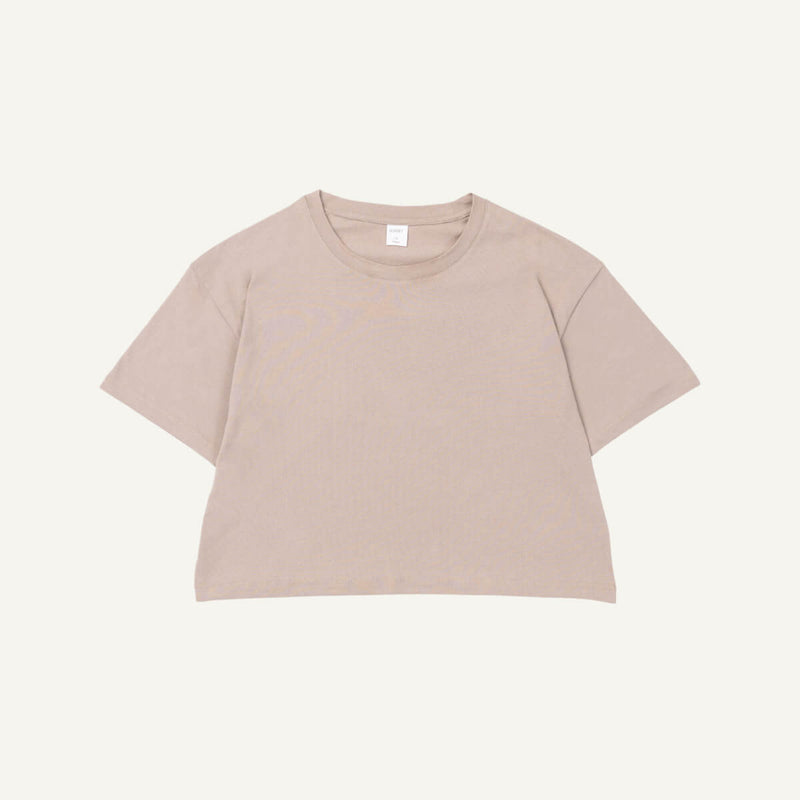 A stone beige organic cotton Boxy Tee.