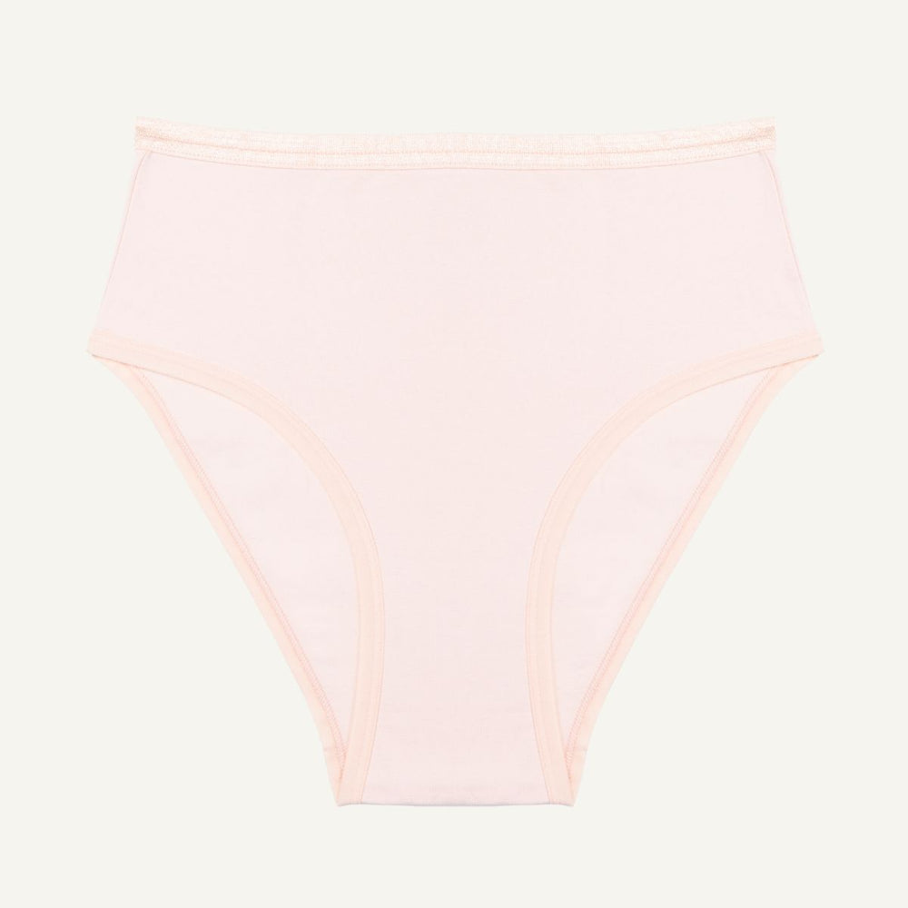 A high-waisted light pink quartz brief made from organic cotton.