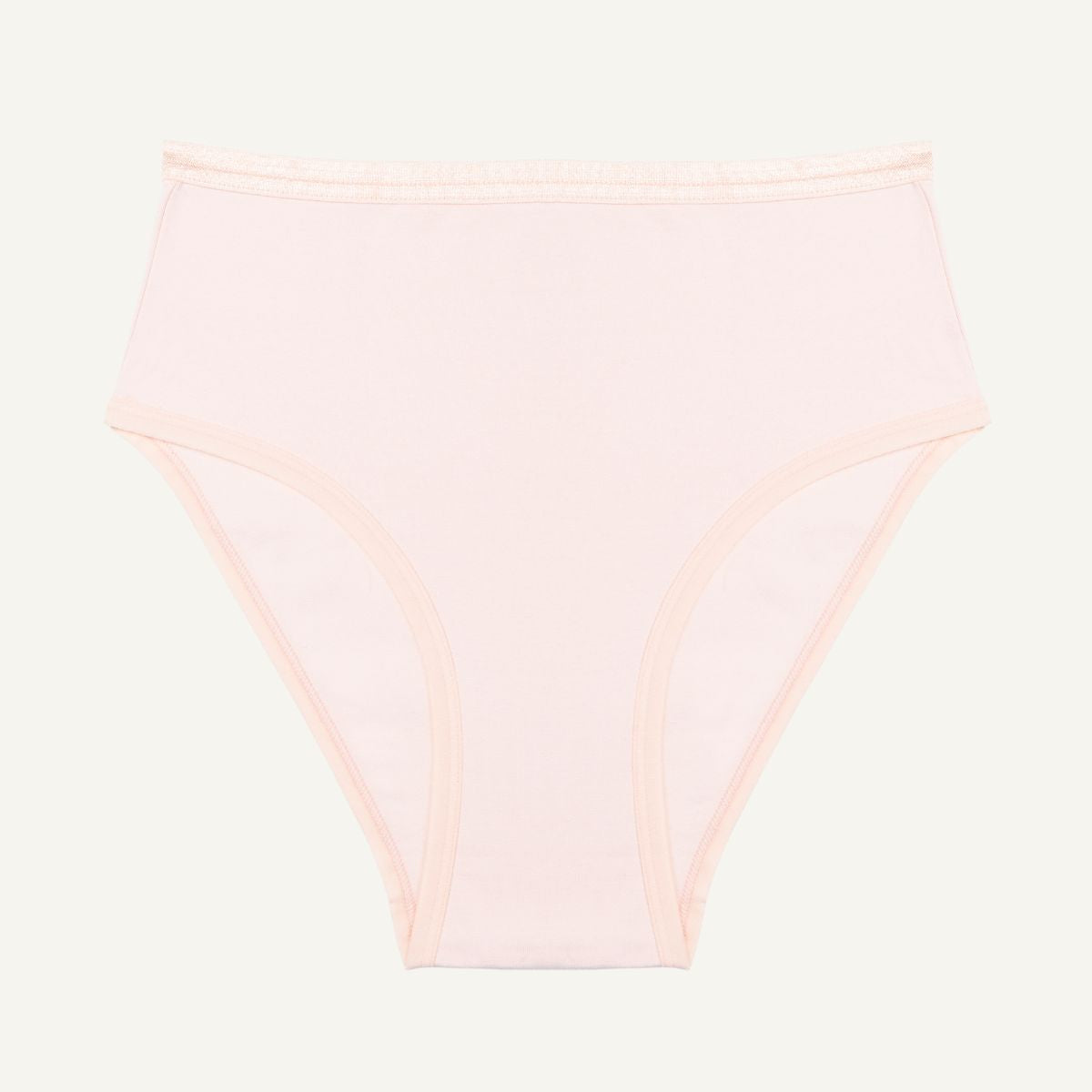 A high-waisted light pink quartz brief made from organic cotton.