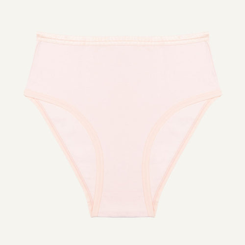 A high-waisted light pink quartz brief made from organic cotton.