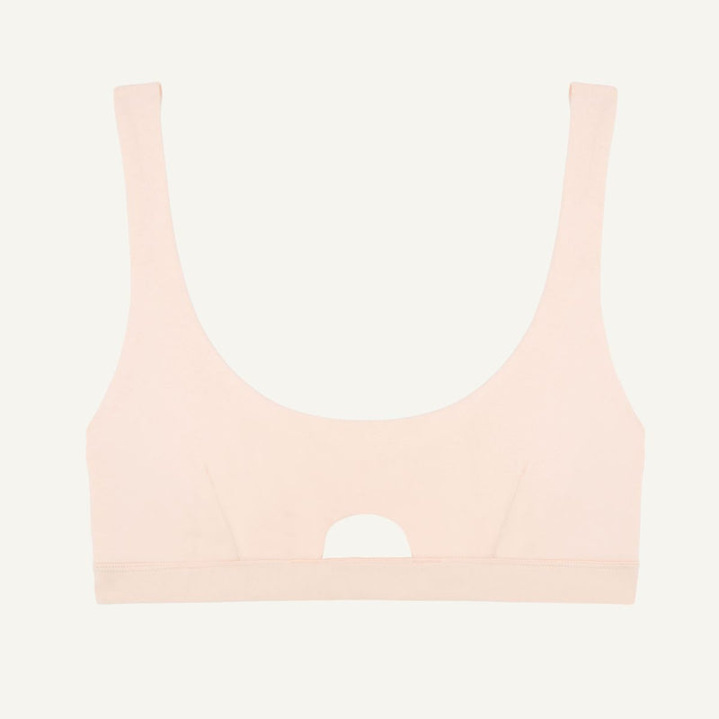 A light pink quartz organic cotton keyhole soft bra without underwires.