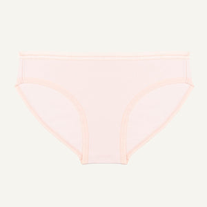A low-rise brief in a light pink quartz color made from organic cotton.