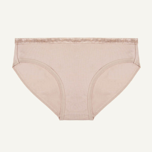 A low-rise brief in stone color made from organic cotton.