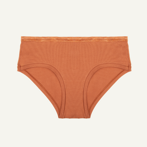 An organic cotton mid-rise hipster underwear in a spice color.