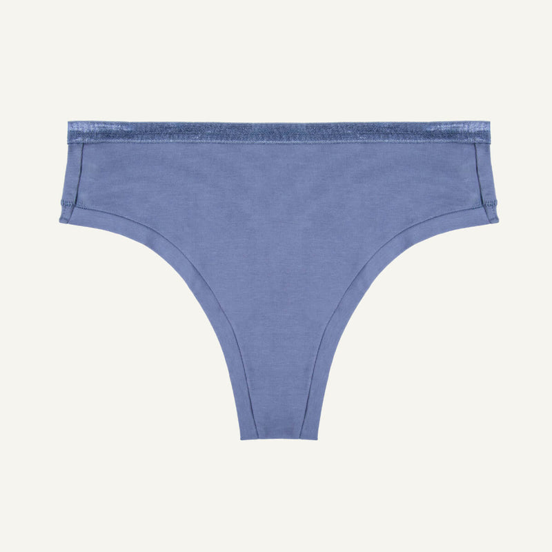 A mid-rise thong underwear in a solid gale color.
