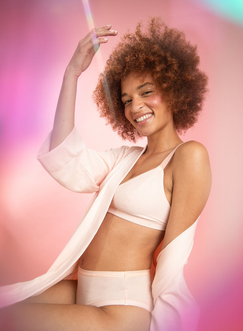 Quartz light pink organic cotton essential robe, triangle soft bra, and mid rise bikini.