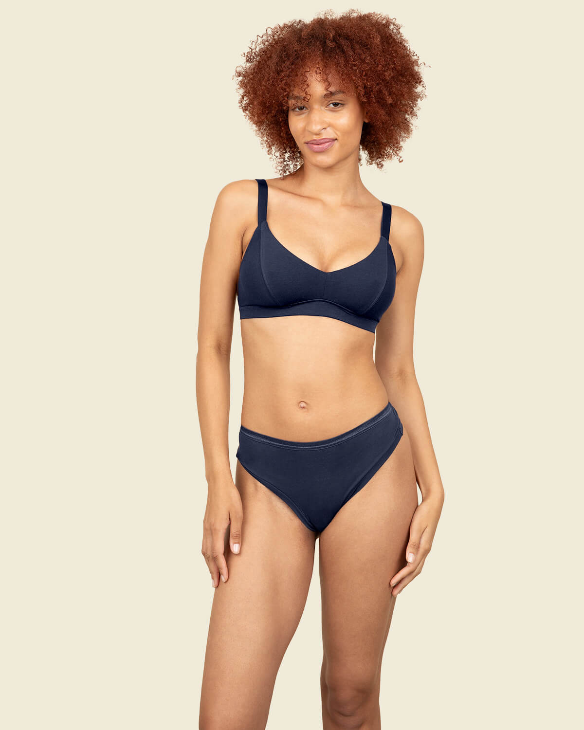 Organic cotton mid rise thong and triangle soft bra in marine.