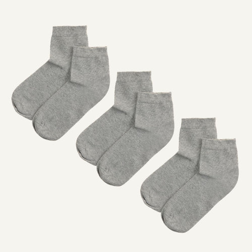 Three sets of gray quarter socks designed to stop above the ankle, presented in a bundle of three.