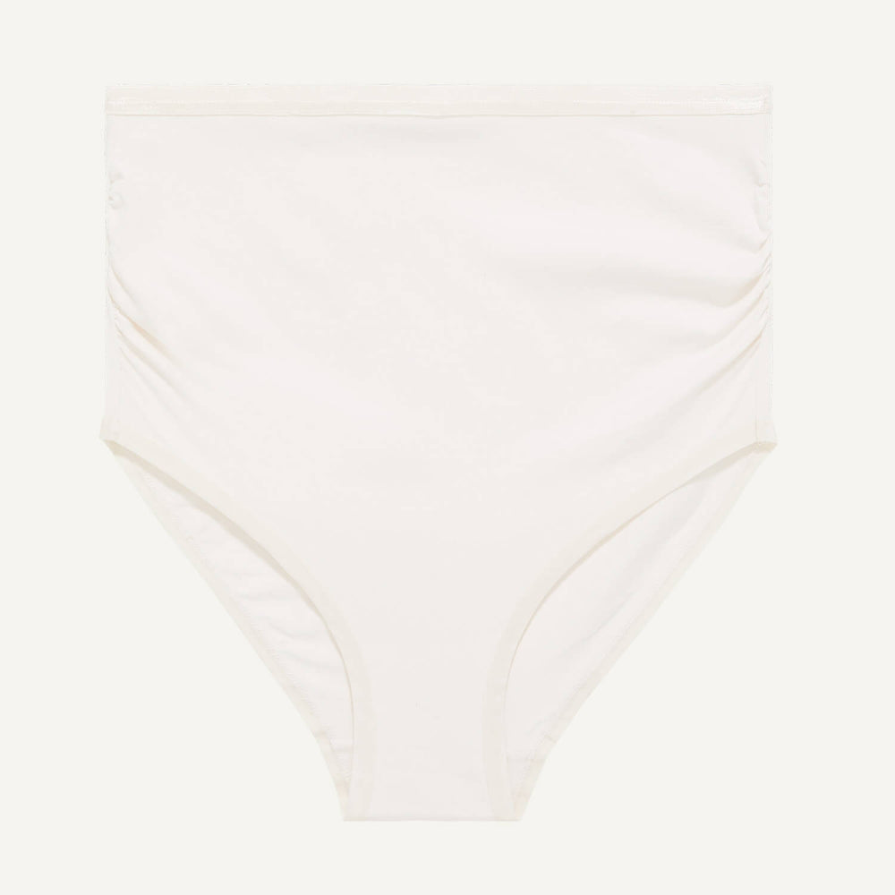 A maternity above belly brief in cloud nine white color.