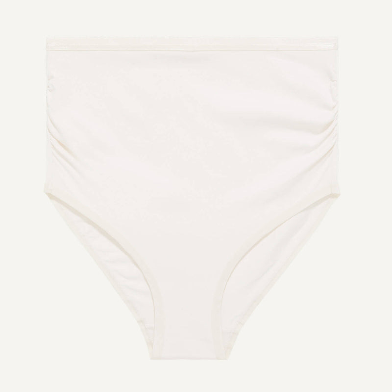 A maternity above belly brief in cloud nine white color.