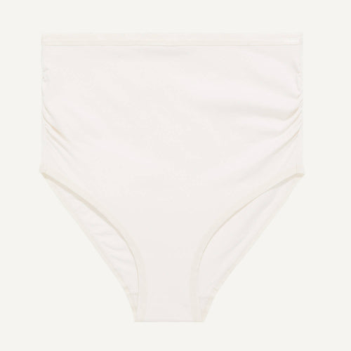 A maternity above belly brief in cloud nine white color.