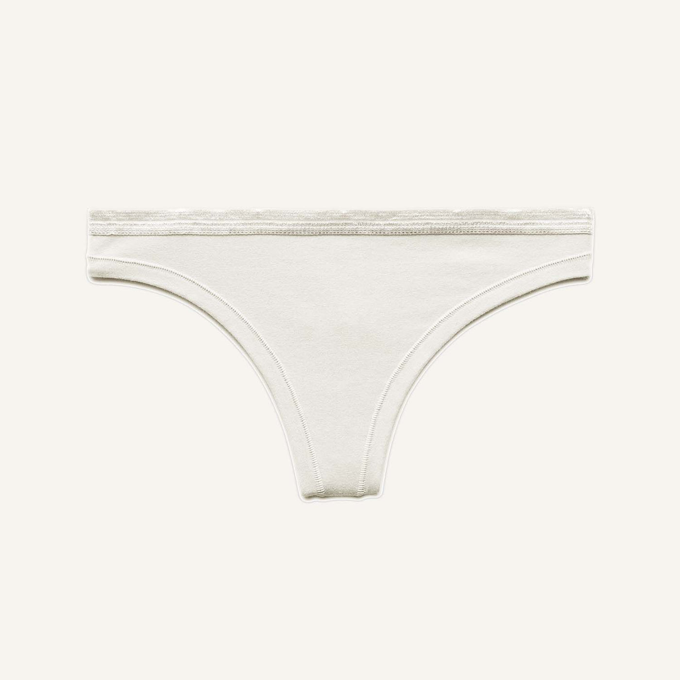 A low rise thong in cloud nine white color.