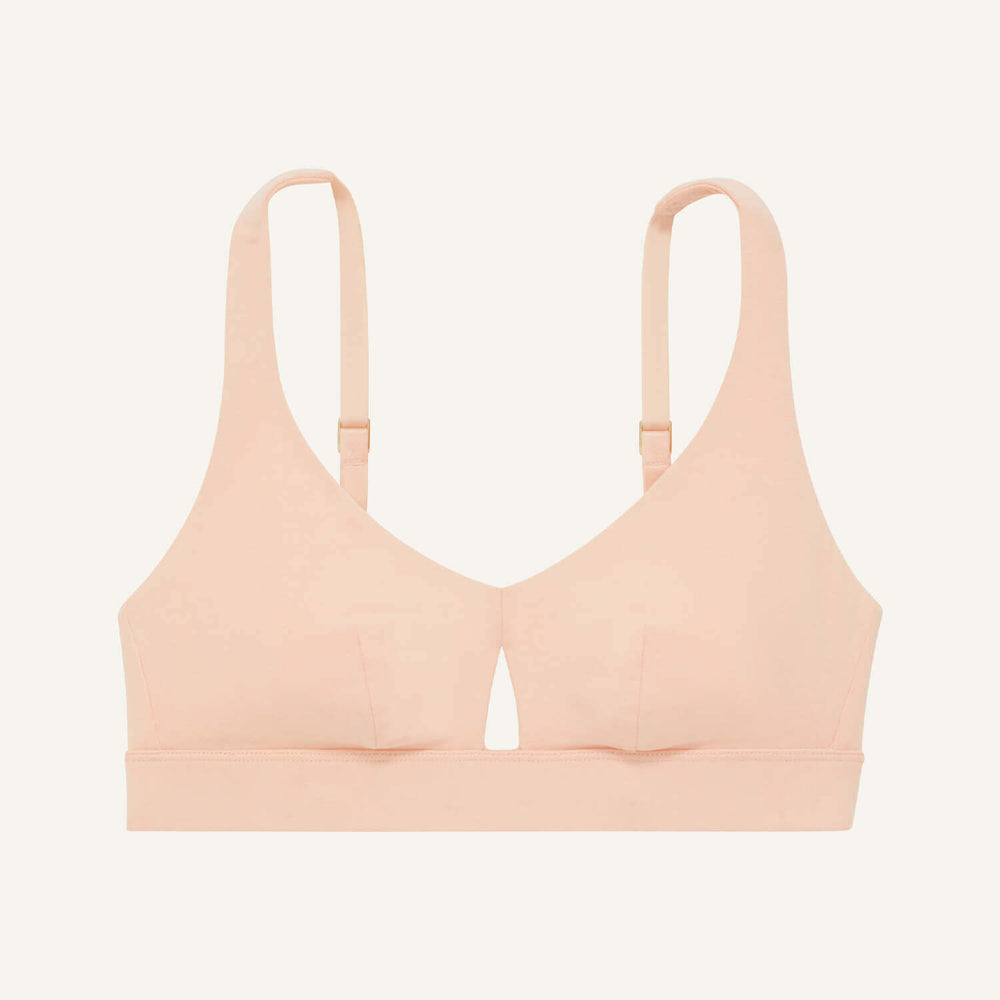 A keyhole bra in peach pink color.