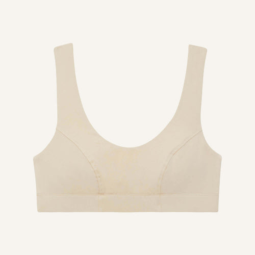 A scoop bralette in wheat beige color.